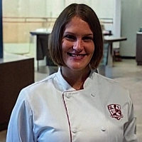 Alyssa Duff, Indianapolis food procurement expert and founder of INDYpendent Bytes, in chef whites.